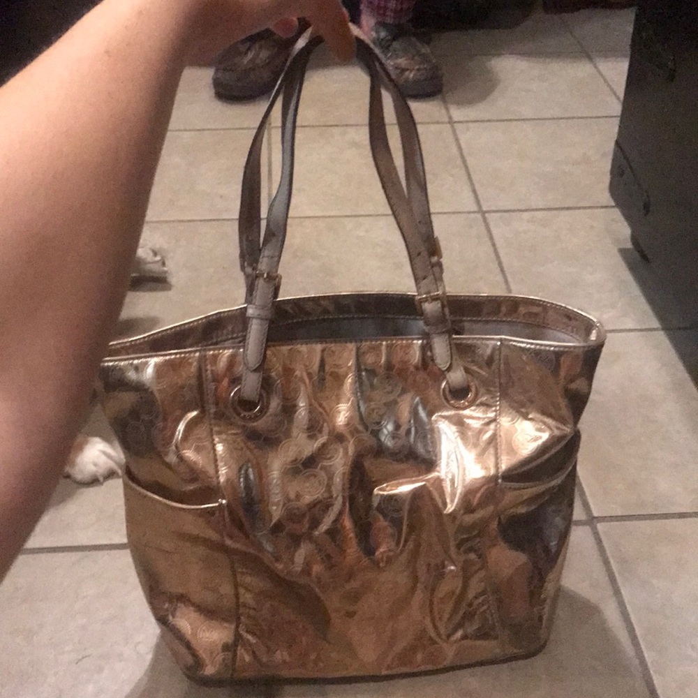 Rose gold Michael Kors purse